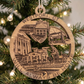 Mellow Monkey Westport CT wooden ornament featuring engraved town landmarks hanging on a Christmas tree branch.