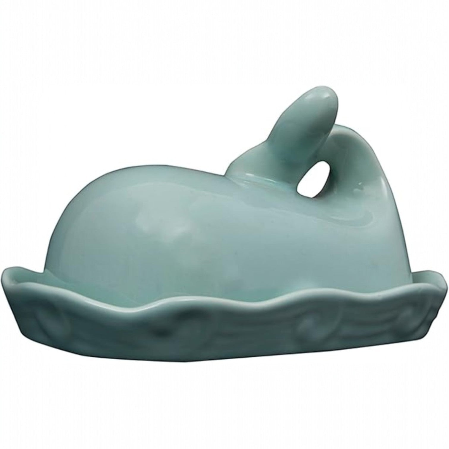 Mellow Monkey aqua ceramic whale butter dish with lid, tail handle, and wave rim detail.