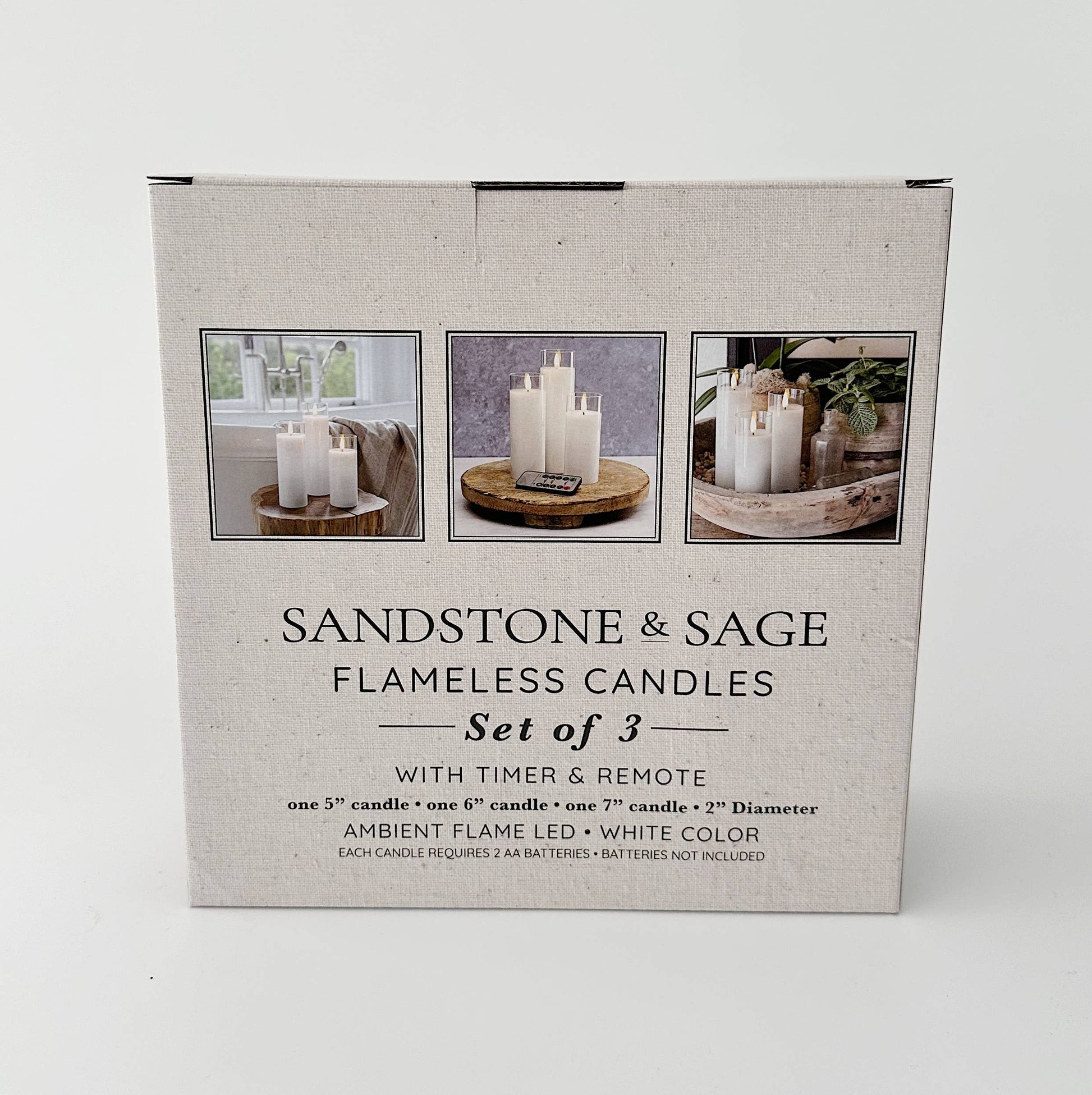Mellow Monkey set of three white flameless LED pillar candles in glass holders with remote control and timer feature.