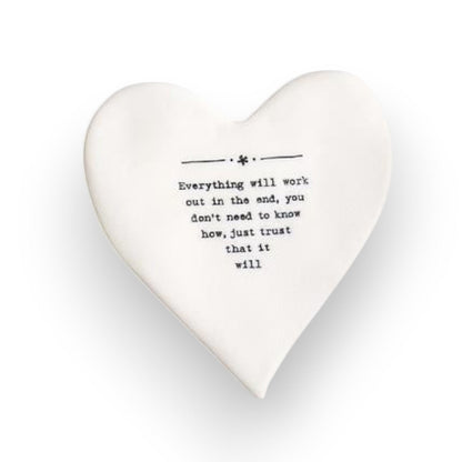 Mellow Monkey white porcelain heart-shaped coaster with black Everything will work out text on a white background.