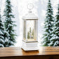 Mellow Monkey white plastic water lantern featuring an animated reindeer figurine and swirling glitter holiday decor.