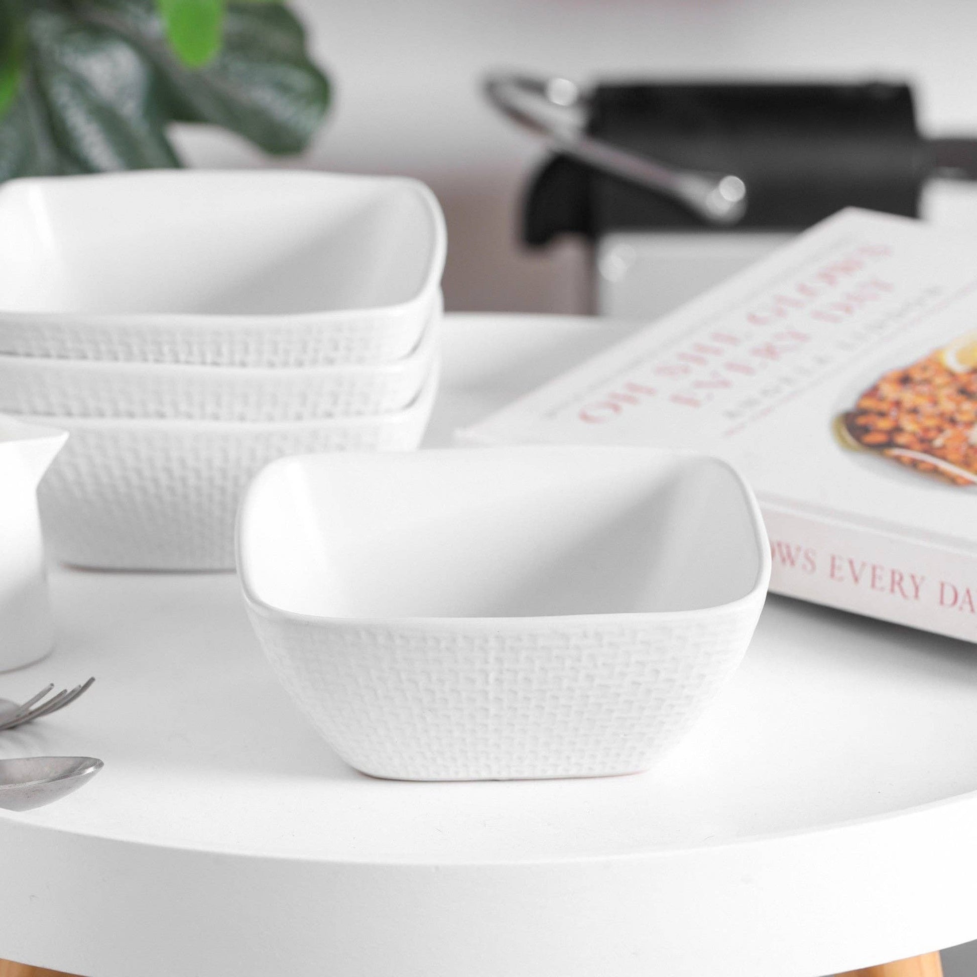 Mellow Monkey Olivia white stoneware square bowl with embossed weave design, perfect for casual or formal dining.