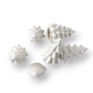 Mellow Monkey set of six small white stoneware Christmas trees for winter holiday mantel and table decor.