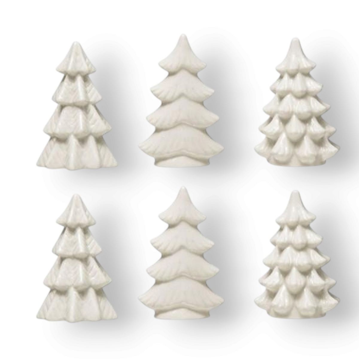 Mellow Monkey set of six small white stoneware Christmas trees for holiday mantel and table decor