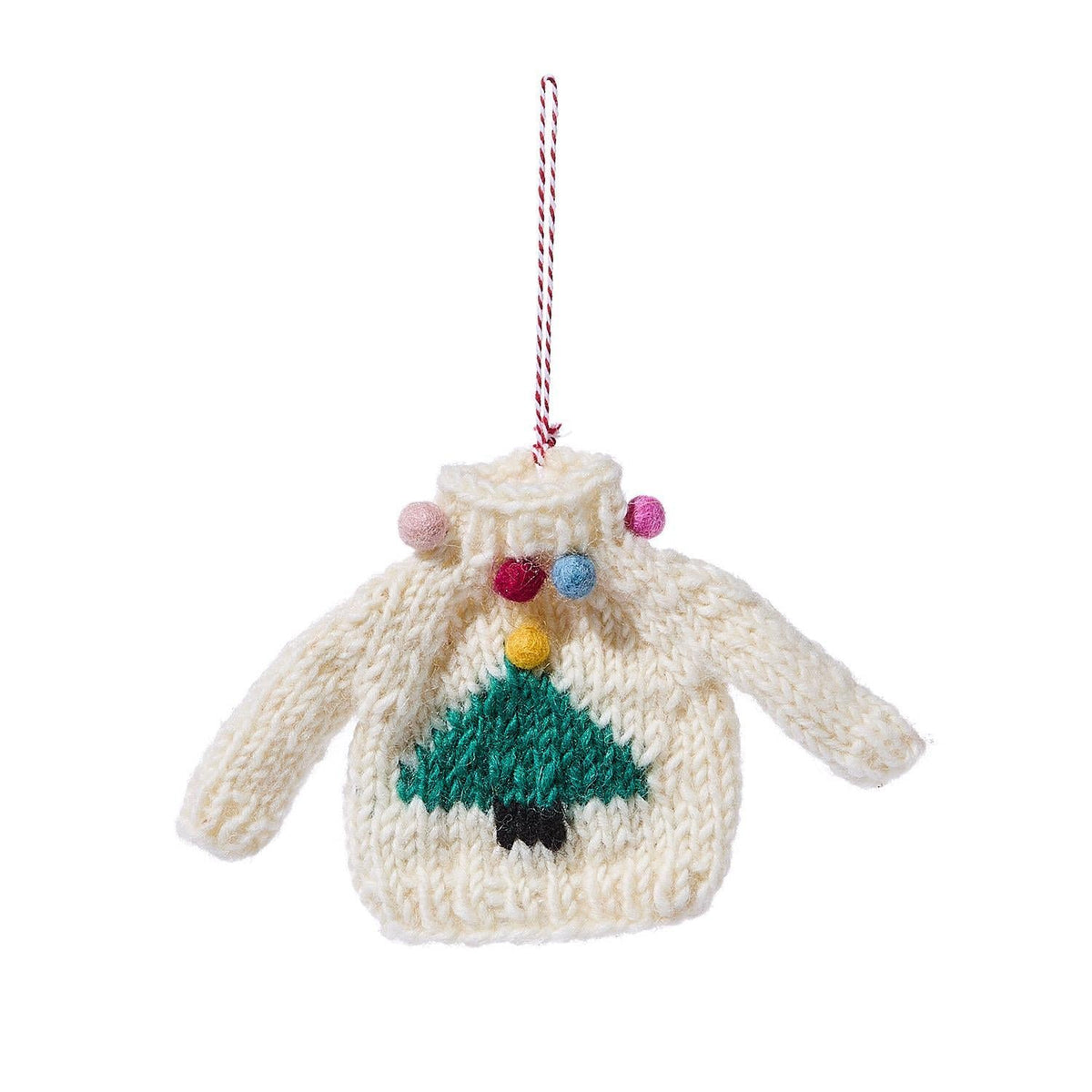 Mellow Monkey white wool sweater Christmas ornament featuring a green tree design and colorful pom-pom accents.
