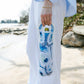 Mellow Monkey Ebb and Flow neoprene wine tote with blue abstract art by Kim Hovell. Holds 750ml-1L bottle.
