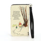 Mellow Monkey beige vinyl Winnie the Pooh book wallet with a classic storybook illustration and wristlet strap.