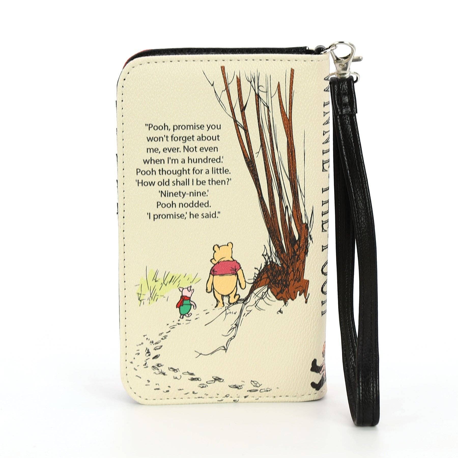 Mellow Monkey beige vinyl Winnie the Pooh book wallet with a classic storybook illustration and wristlet strap.