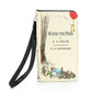 Mellow Monkey beige Winnie the Pooh book-style vinyl wallet with a detachable black wristlet strap.