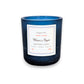 Mellow Monkey Winter's Night soy-blend candle in a dark blue glass jar with a decorative storybook-style label.