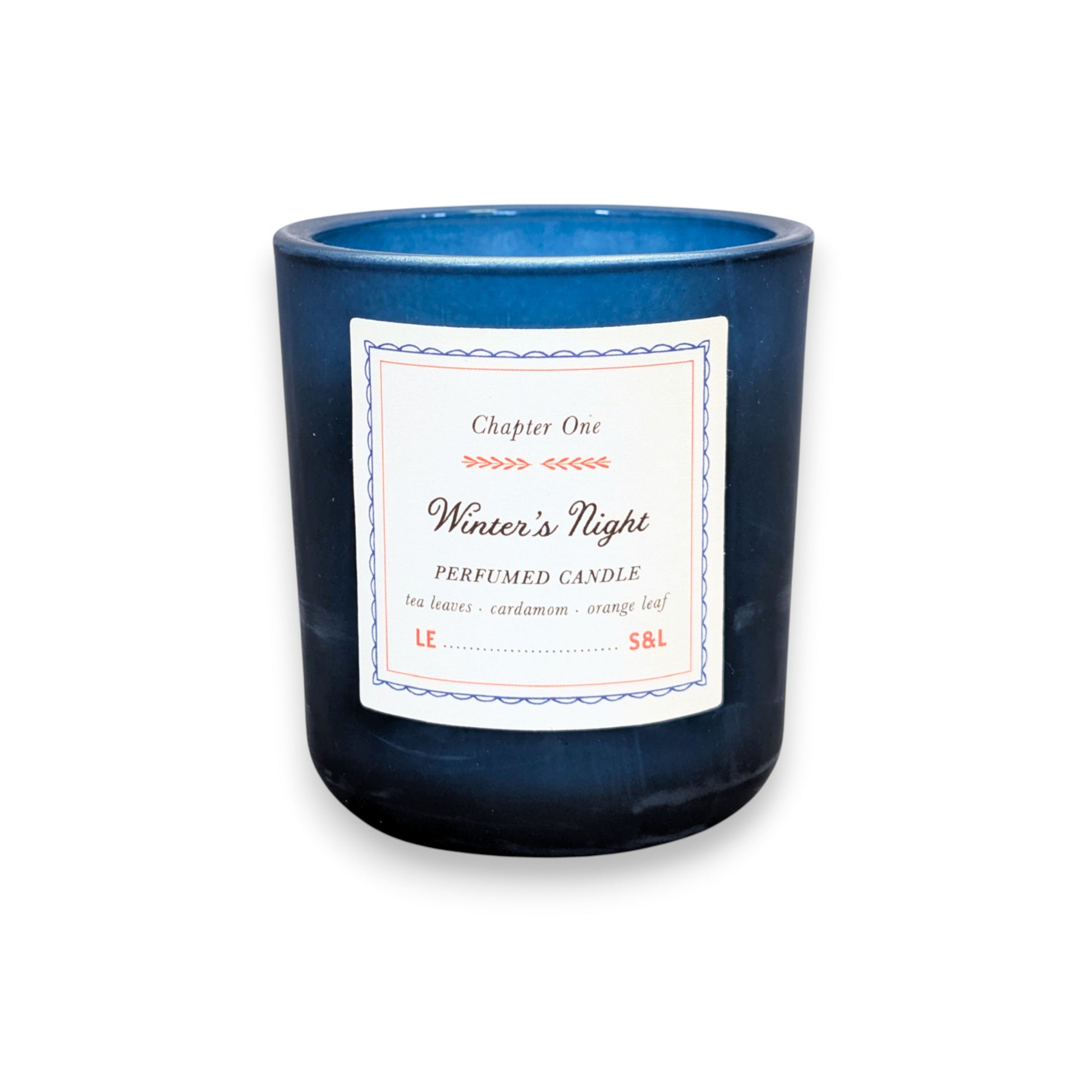Mellow Monkey Winter's Night soy-blend candle in a dark blue glass jar with a decorative storybook-style label.