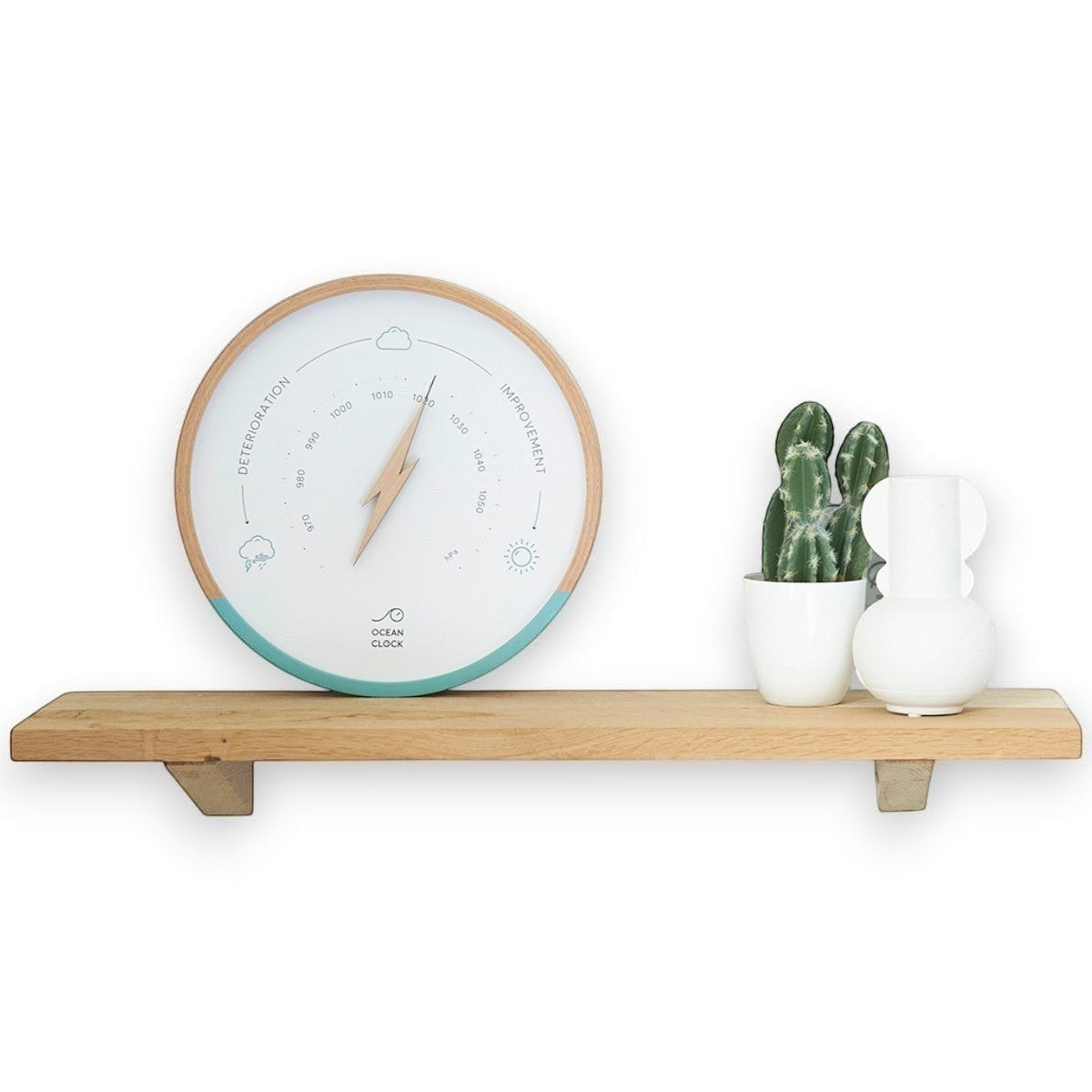 Mellow Monkey white and turquoise wood barometer with beech frame and glass face, forecasts weather.