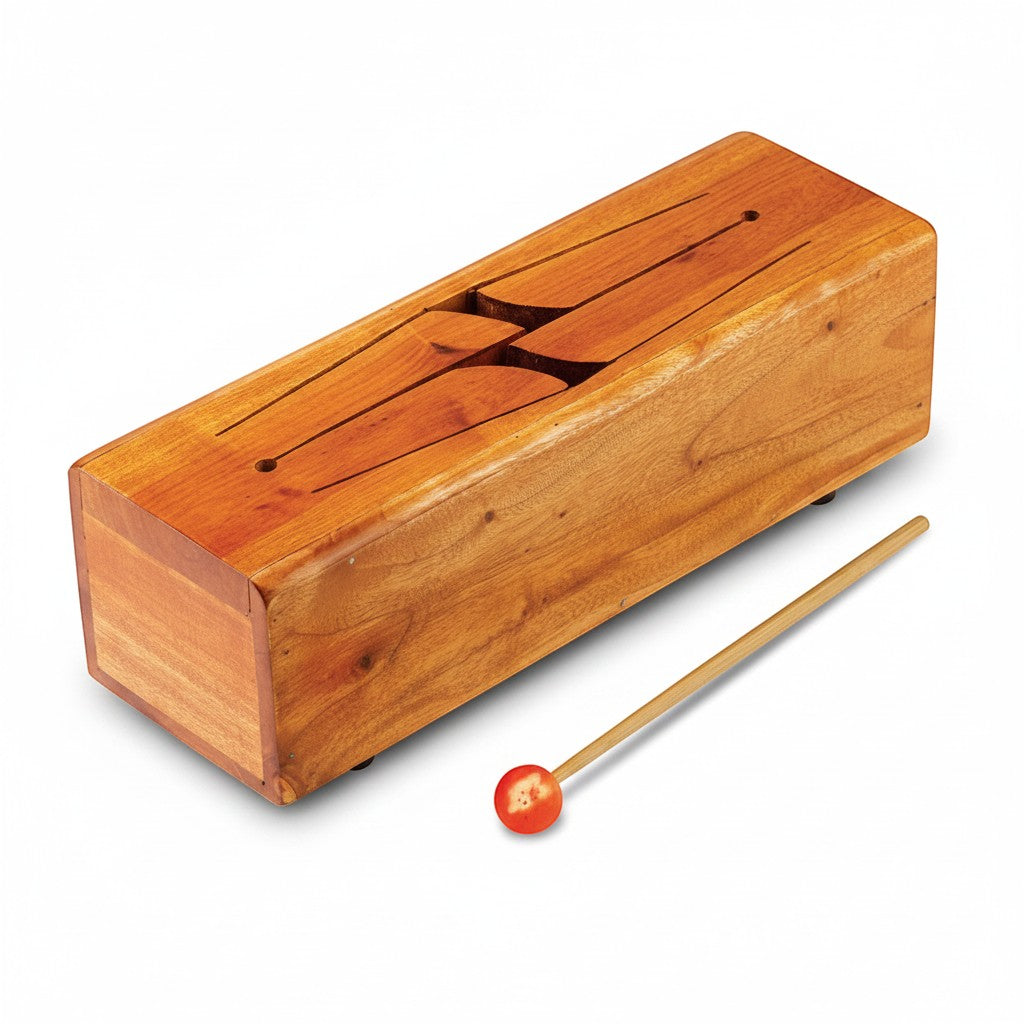 Mellow Monkey wooden tongue drum with beater. Natural wood finish, rectangular shape with carved tongues for musical notes.