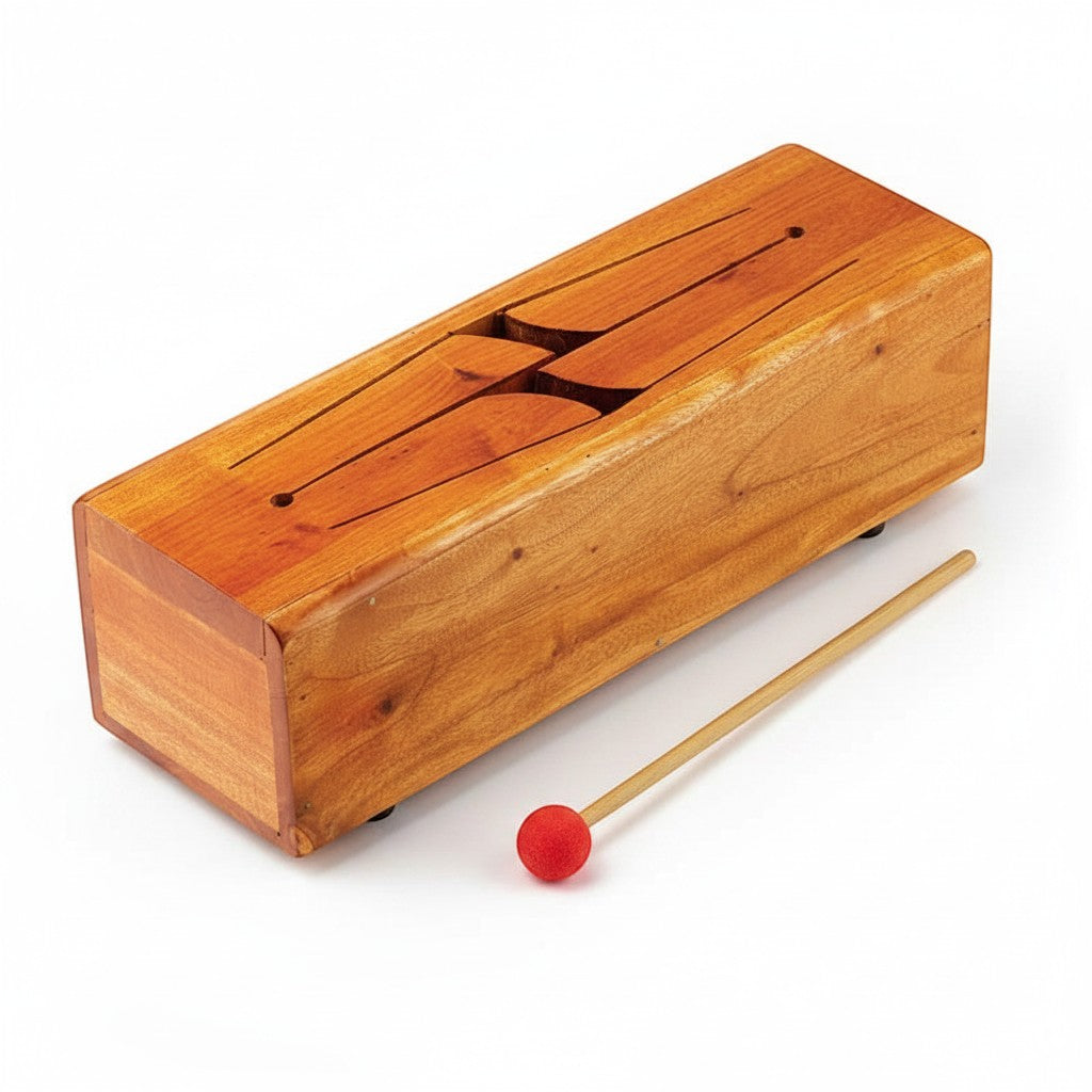 Mellow Monkey wooden tongue drum with mallet, natural wood finish, for musical exploration and meditation.