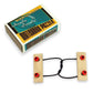 Mellow Monkey wooden brainteaser puzzle featuring two light wood blocks connected by a knotted black cord and red beads