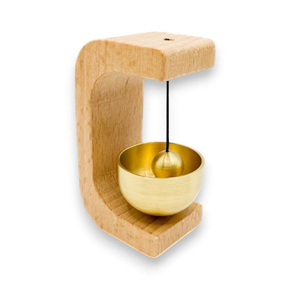 Mellow Monkey 3-inch wooden door chime with a brass metal bowl and hanging striker for a gentle musical sound.