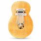 Mellow Monkey wooden thumb piano with 7 metal tines and carved floral details. 10.5-inch kalimba.