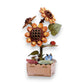 Mellow Monkey DIY wooden sunflower puzzle kit with 115 pieces, featuring orange and brown petals, green leaves, and decorative signs.