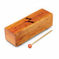 Mellow Monkey wooden tongue drum with beater, natural wood finish, carved top for musical notes.