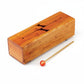 Mellow Monkey 13-inch natural wood tongue drum with mallet, ideal for relaxation and mindfulness.