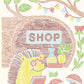Mellow Monkey Woodland Whimsy Trace by Line art pad page featuring a cute hedgehog in a forest shop scene.