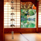 Mellow Monkey Woodstock Temple Bells Quintet in copper hanging in a zen-inspired room with shoji screens and garden view