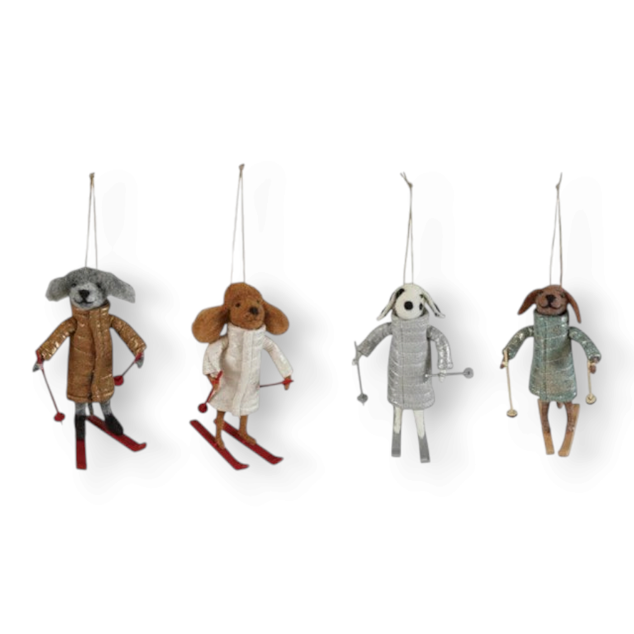 Mellow Monkey handcrafted wool felt dog ornaments wearing quilted coats and holding skis for winter holiday decor