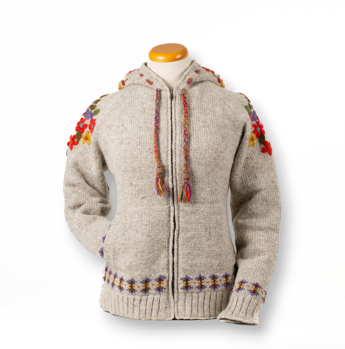 Mellow Monkey light natural wool zip hoodie featuring vibrant floral embroidery, braided drawstrings, and Fair Isle trim.