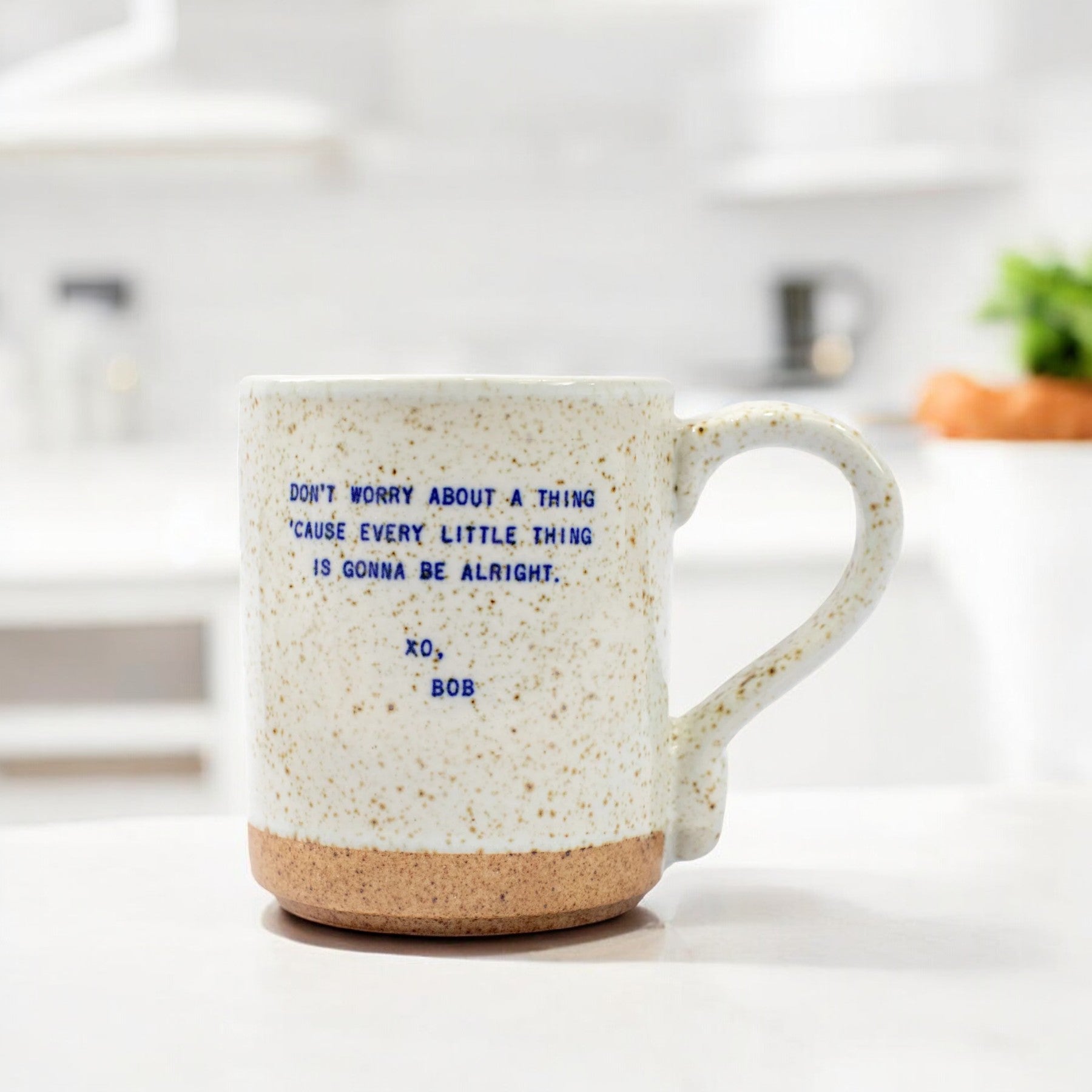 Mellow Monkey XO Bob mug with blue Bob Marley quote on speckled ceramic, 15 ounce handmade coffee cup