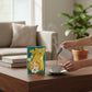 Mellow Monkey yellow cat acrylic wall art with white flowers and teal background, 5x7 inches.