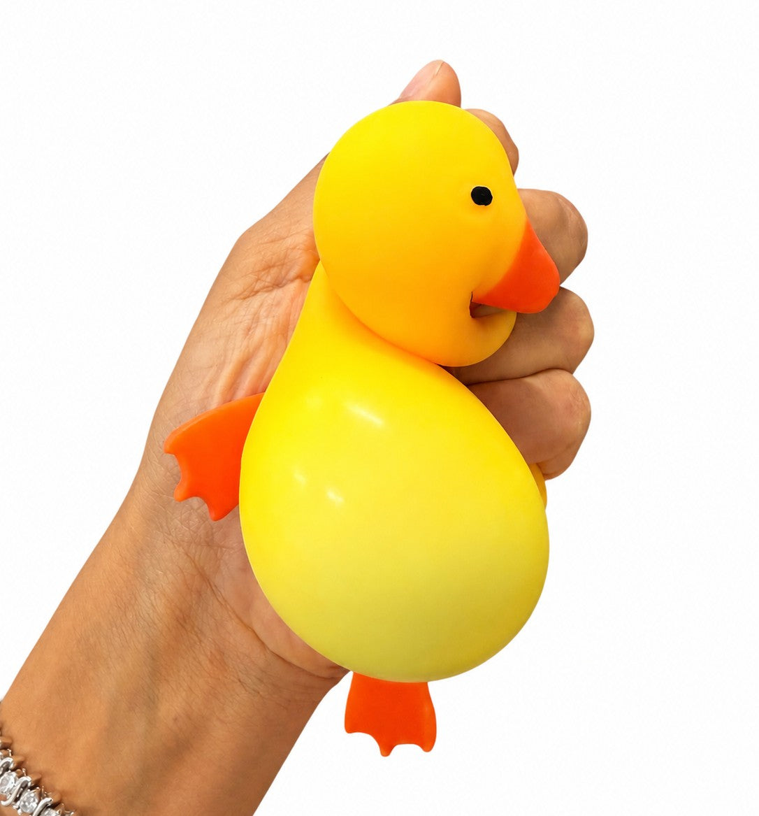 Mellow Monkey yellow duck squishy toy being squeezed in a hand for stress relief and sensory play