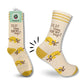 Mellow Monkey pale yellow crew socks with sloth illustrations and the text Is It Time For My Nap?