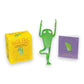 Mellow Monkey Yoga Frog bendable figurine with mini book and yellow box featuring yoga poses for desktop relaxation