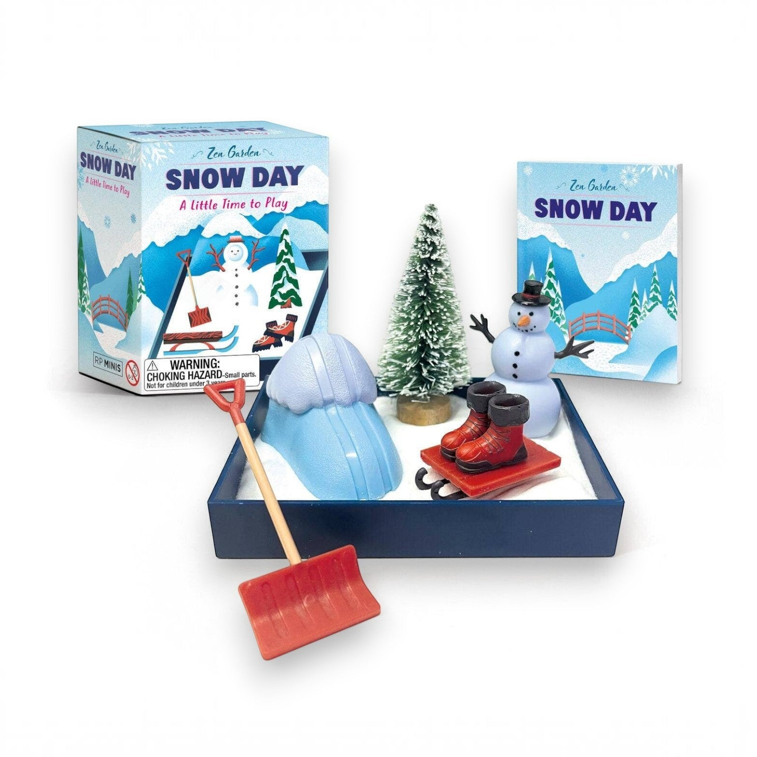 Mellow Monkey Zen Garden Snow Day desktop kit with white sand, mini snowman, pine tree, sled, and meditation book.