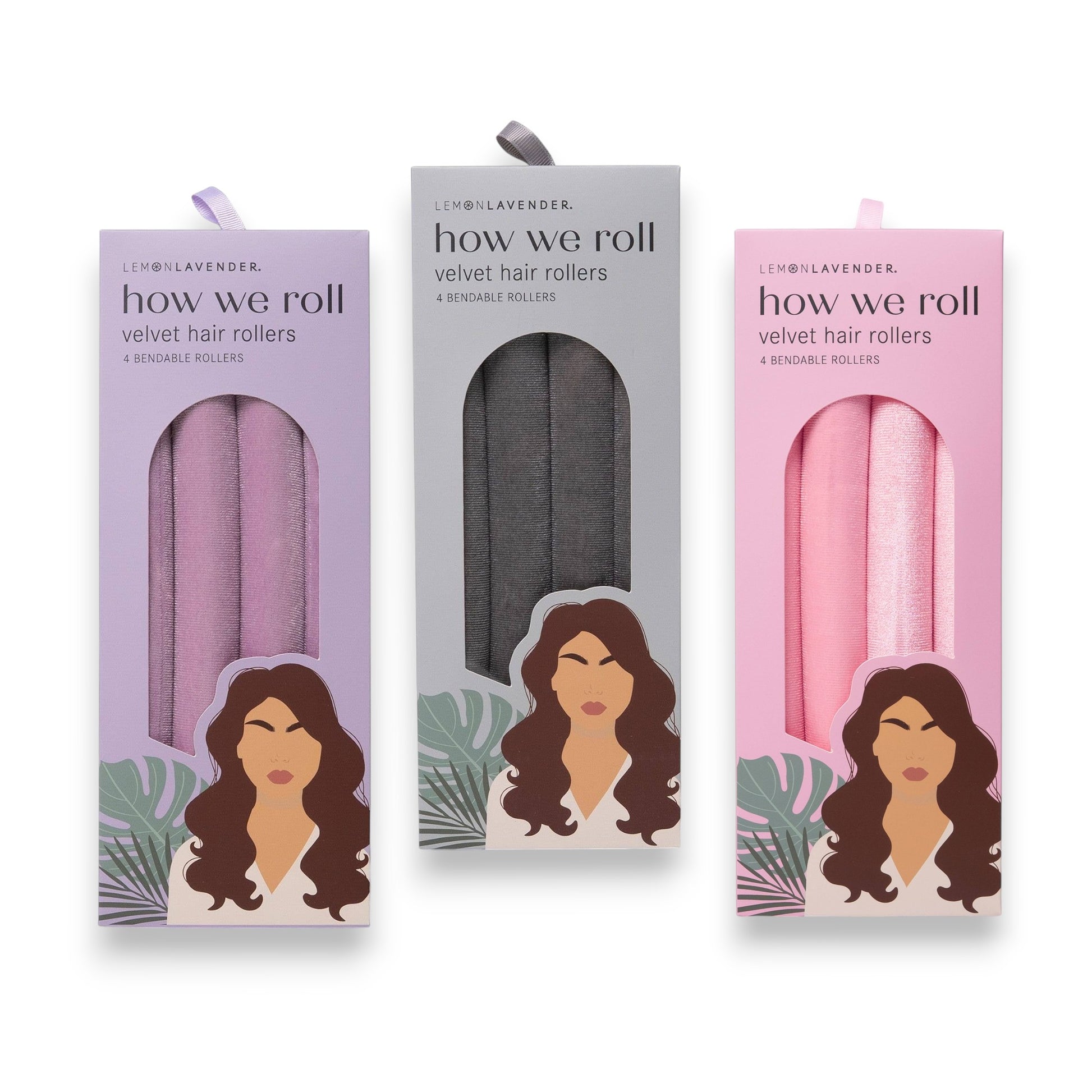 Three packages of 'how we roll' velvet hair rollers in different colors on a white background.